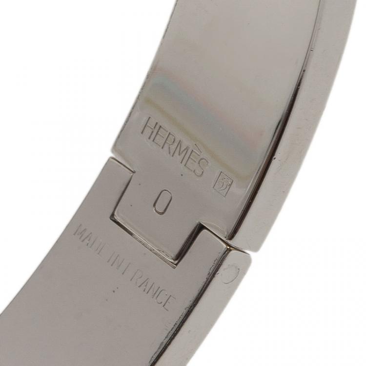 Pre Owned Hermes Clic Clac H Orange Enamel Palladium Plated Bracelet