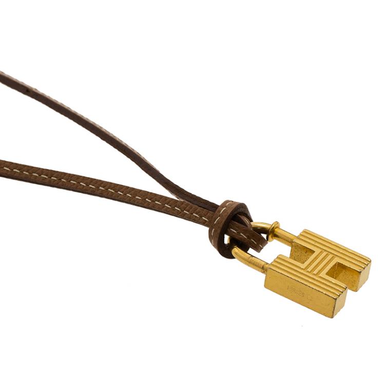 Pre Owned Hermes 2000 "Premiers Pas Dans Le Siècle" Cadena Charm Padlock