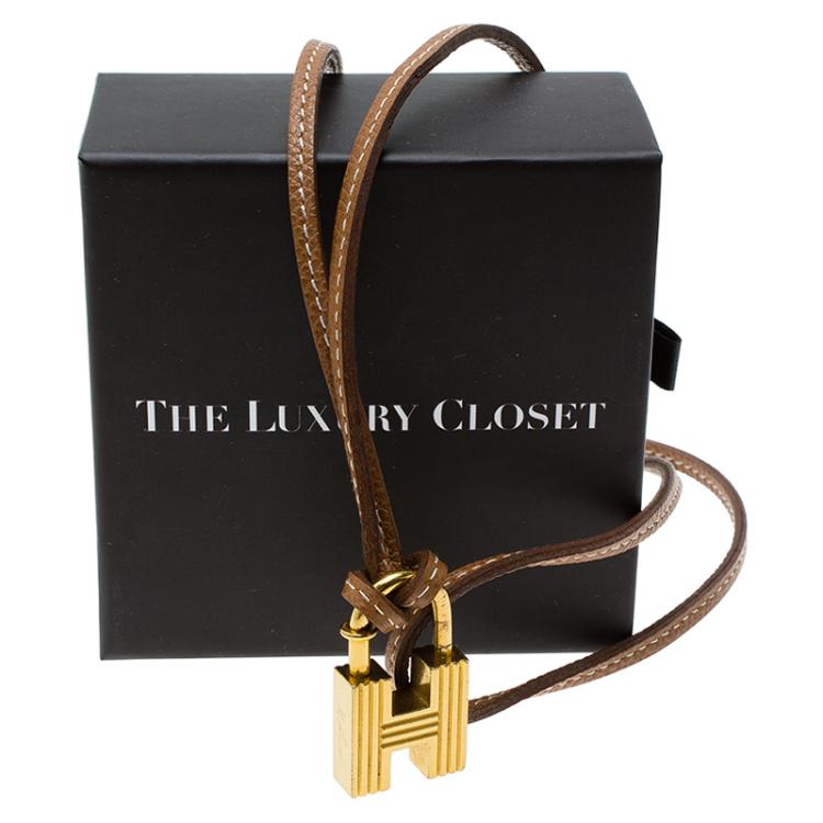 Pre Owned Hermes 2000 "Premiers Pas Dans Le Siècle" Cadena Charm Padlock