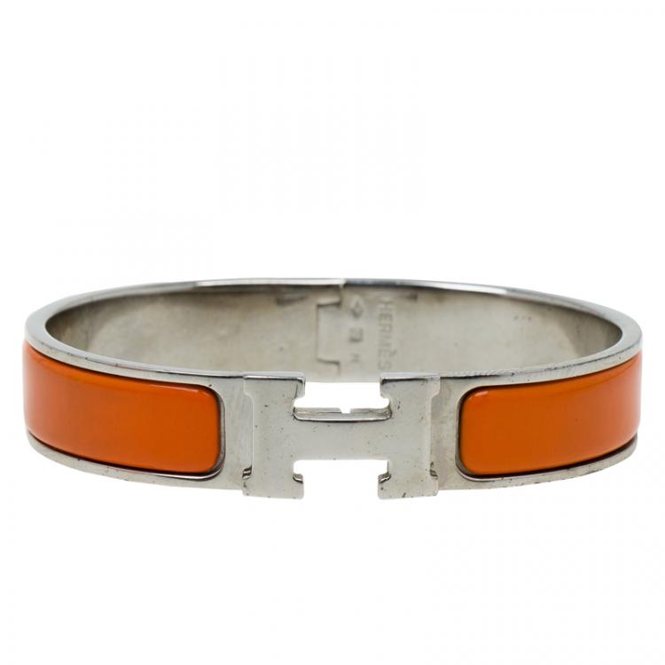 Pre Owned Hermes Clic Clac H Orange Enamel Palladium Plated Bracelet PM