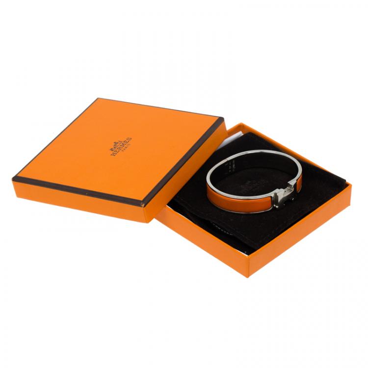 Pre Owned Hermes Clic Clac H Orange Enamel Palladium Plated Bracelet PM