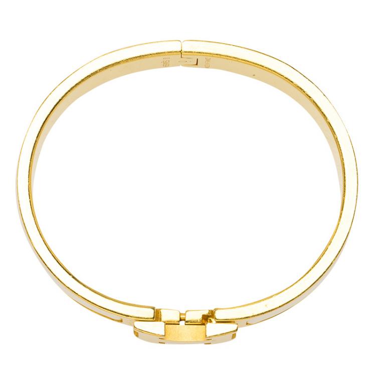 Pre Owned Hermes Clic Clac H White Enamel Gold Plated Narrow Bracelet PM
