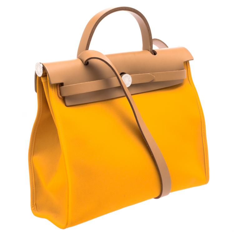 Pre Owned Hermes Jaune Dor Yellow Canvas and Leather Herbag Zip 31 Bag