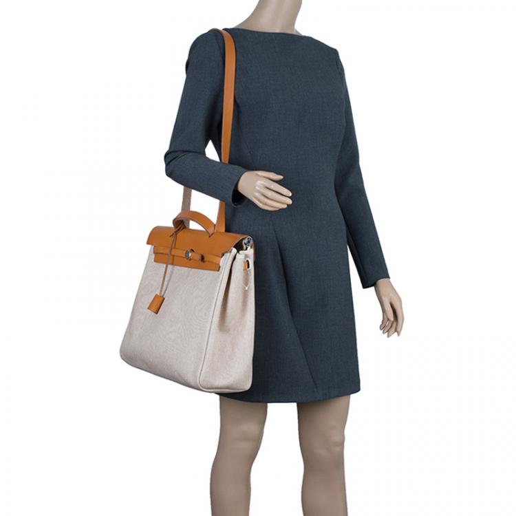 Pre Owned Hermes Tan Leather and Beige Toile Canvas Large Herbag