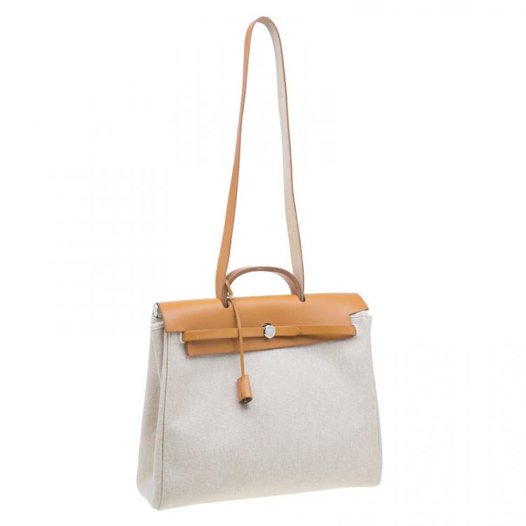 Pre Owned Hermes Tan Leather and Beige Toile Canvas Large Herbag