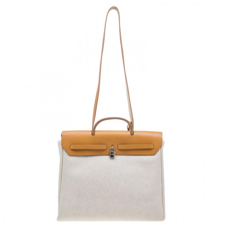 Pre Owned Hermes Tan Leather and Beige Toile Canvas Large Herbag
