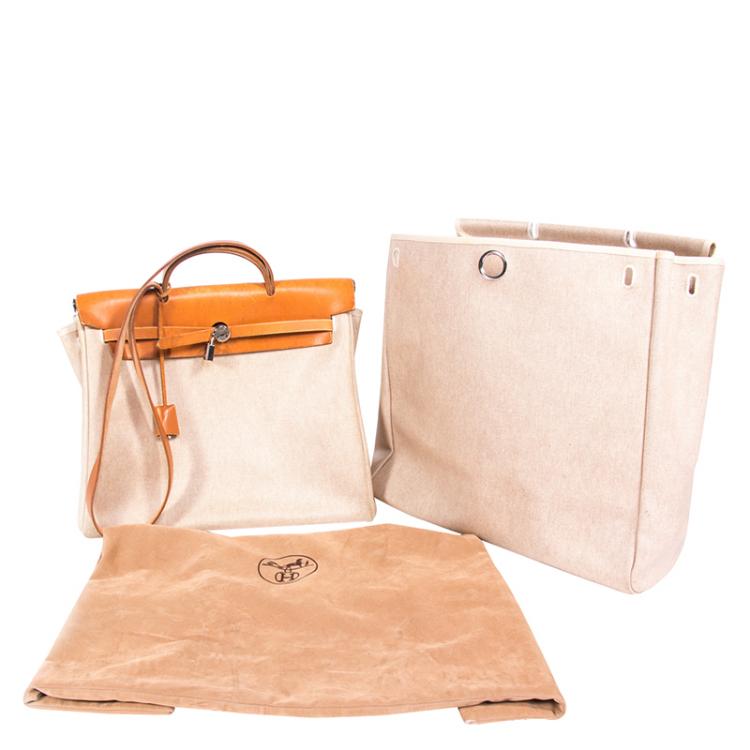 Pre Owned Hermes Beige and Orange Canvas and Vache Calfskin Leather Herbag GM Bag