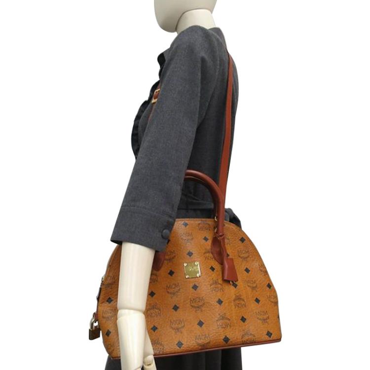 Bags  Authentic Mcm Heritage Top Handle Bag In Cognac Visetos