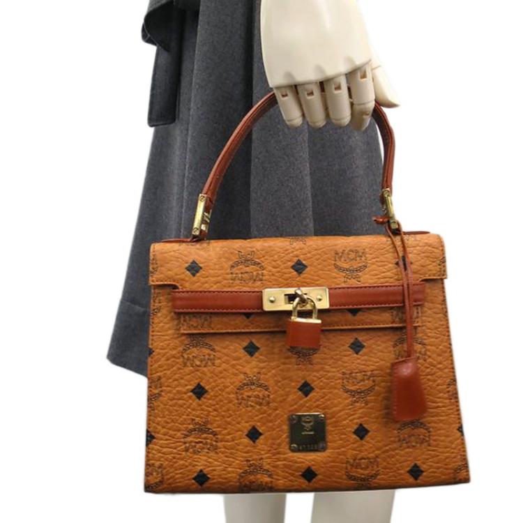 MCM Cognac Visetos Coated Canvas and Leather Mini Heritage Top Handle Bag  MCM | The Luxury Closet