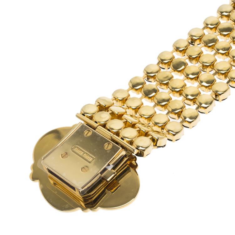 Pre Owned Miu Miu Plexiglass Cameo Crystal Embellished Gold Tone Wide Bracelet 17cm