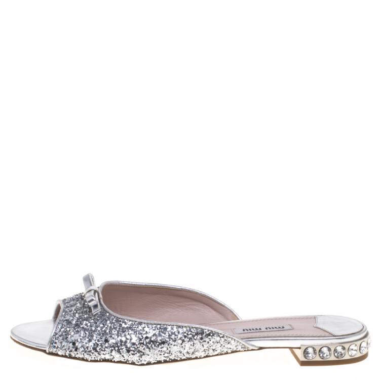Pre Owned Miu Miu Silver Glitter Bow Detail Jeweled Heel Flat Slides Size 38
