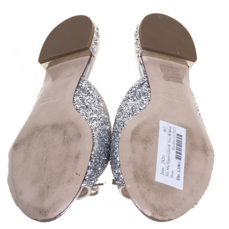 Pre Owned Miu Miu Silver Glitter Bow Detail Jeweled Heel Flat Slides Size 38
