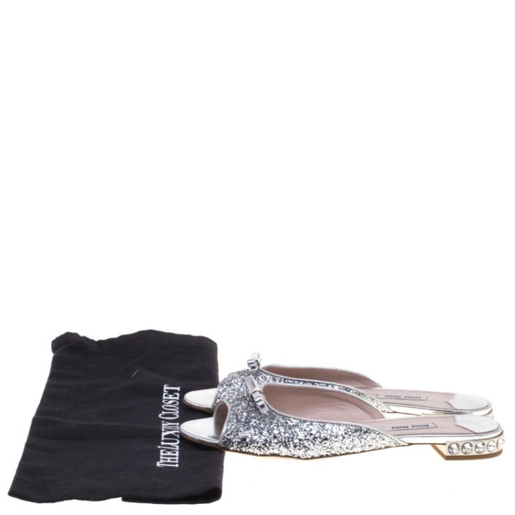 Pre Owned Miu Miu Silver Glitter Bow Detail Jeweled Heel Flat Slides Size 38