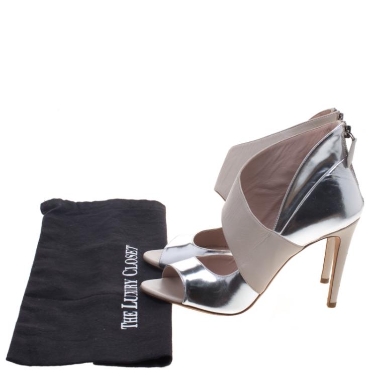 Pre Owned Miu Miu Two Tone Leather Asymmetrical Strap Peep Toe Pumps Size 38.5