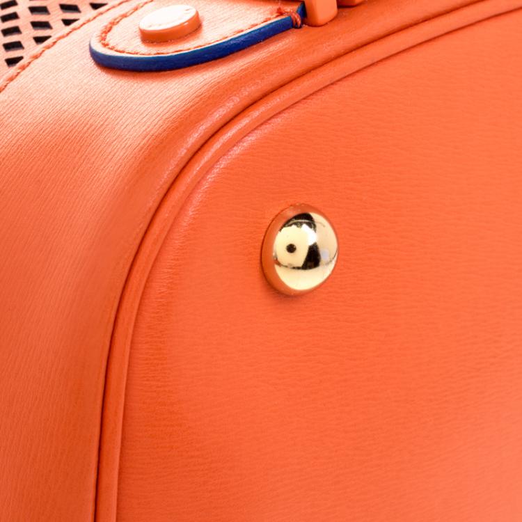 Pre Owned Moschino Orange Perforated Leather Drawstring Bucket Hobo