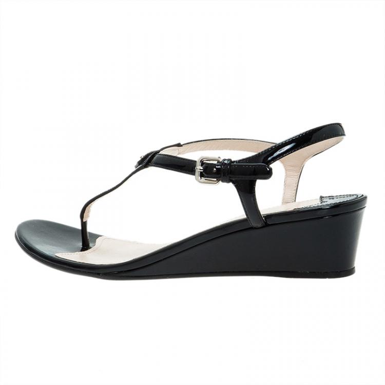 مملوكة مسبقًا Prada Black Leather Logo Wedge Sandals Size 38.5