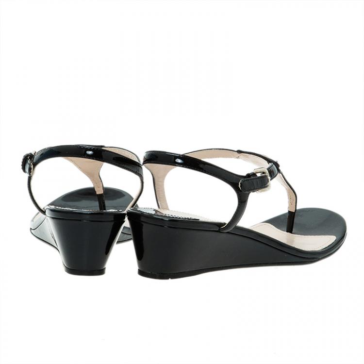 مملوكة مسبقًا Prada Black Leather Logo Wedge Sandals Size 38.5