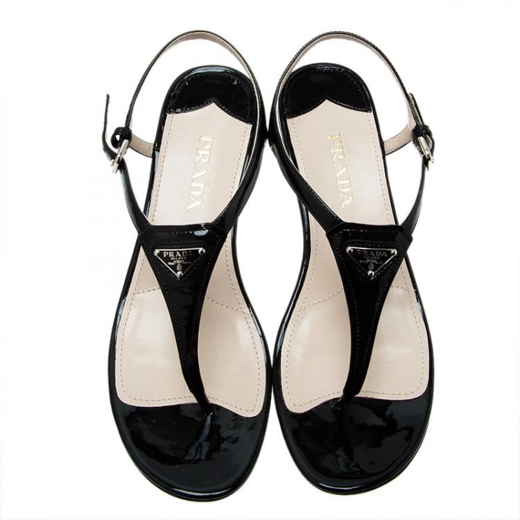 مملوكة مسبقًا Prada Black Leather Logo Wedge Sandals Size 38.5