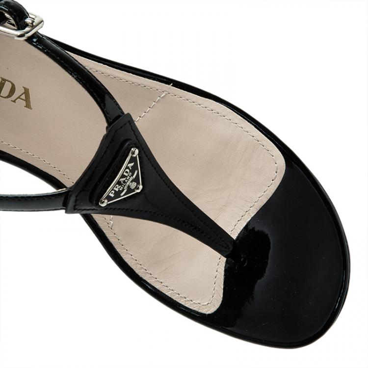 مملوكة مسبقًا Prada Black Leather Logo Wedge Sandals Size 38.5