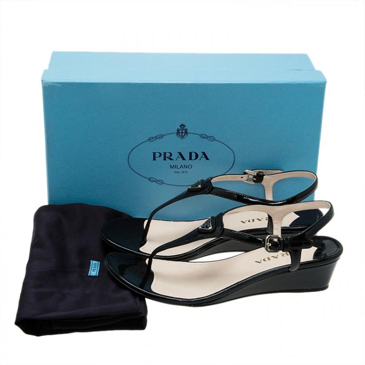 مملوكة مسبقًا Prada Black Leather Logo Wedge Sandals Size 38.5