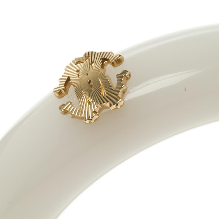 Pre Owned Roberto Cavalli Gold Tone Logo White Resin Wide Bangle