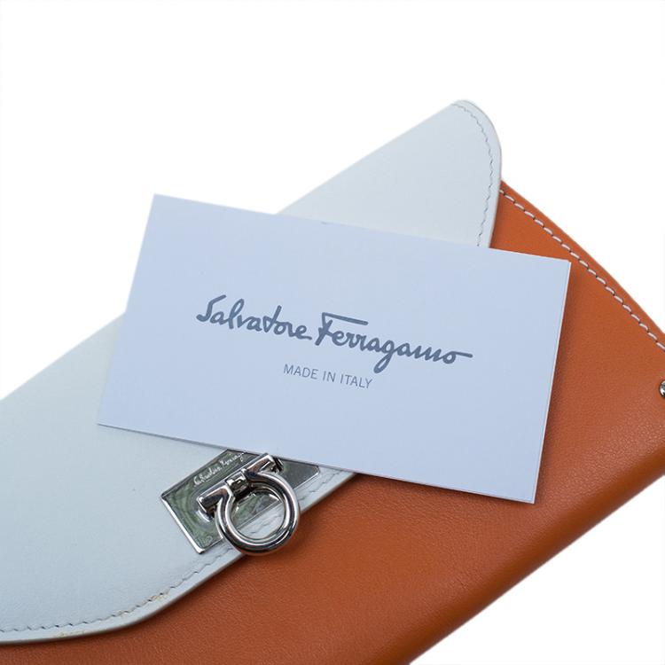 Pre Owned Salvatore Ferragamo Orange and White Leather Gancio Bar Continental Wallet