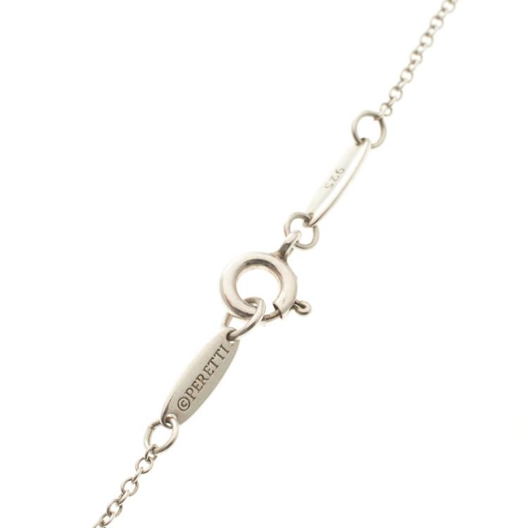 Pre Owned Tiffany & Co. Round Mini Lock Silver Pendant Necklace