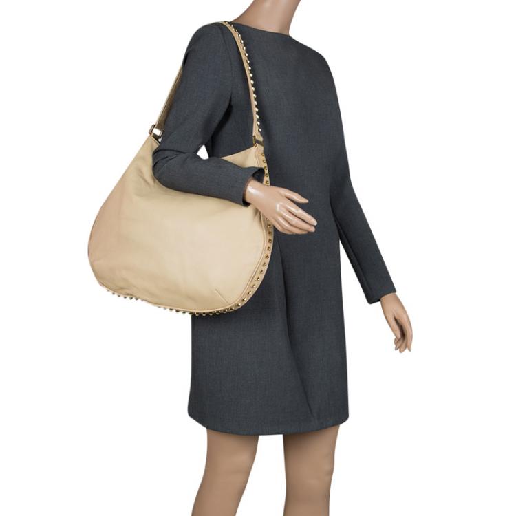 Pre Owned Tory Burch Light Beige Leather Pyramid Studs Hobo