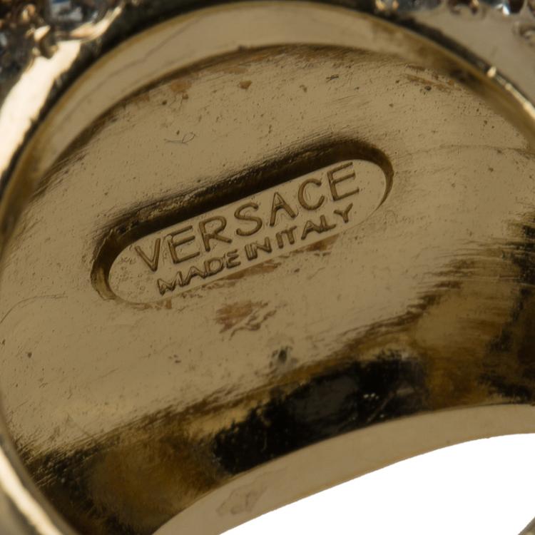 Pre Owned Versace Medusa Crystal Studded Gold Tone Ring Size 55