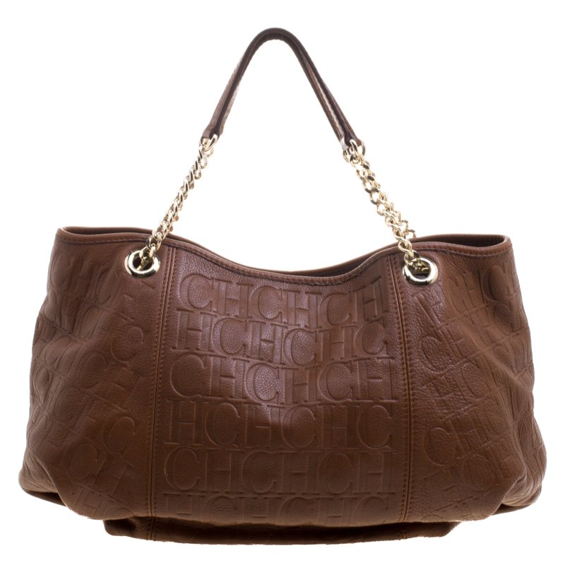 Pre Owned Carolina Herrera Brown Monogram Embossed Leather Dahlia Hobo