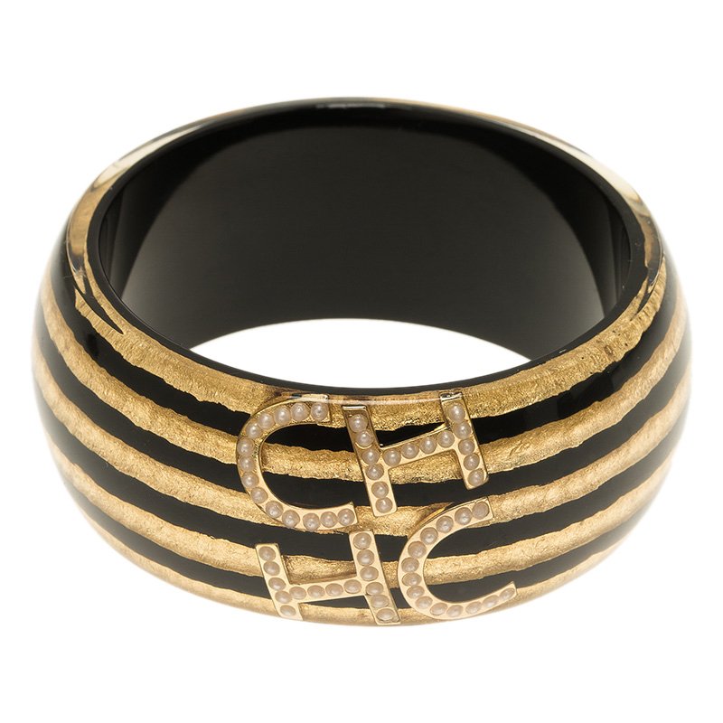 Pre Owned CH Carolina Herrera Black and Gold Resin Bangle Bracelet