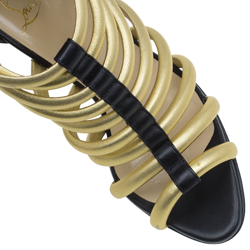 Christian Louboutin Black & Gold Leather Romaine Platform Sandals Golden  Metallic ref.790966 - Joli Closet