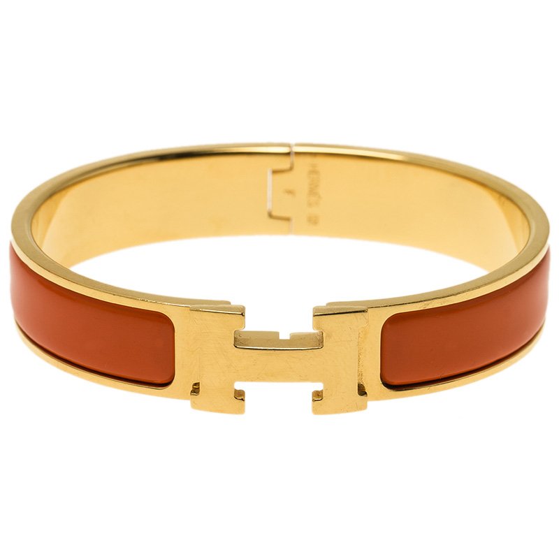 Pre Owned Hermes Clic Clac H Orange Enamel Gold Plated Bracelet