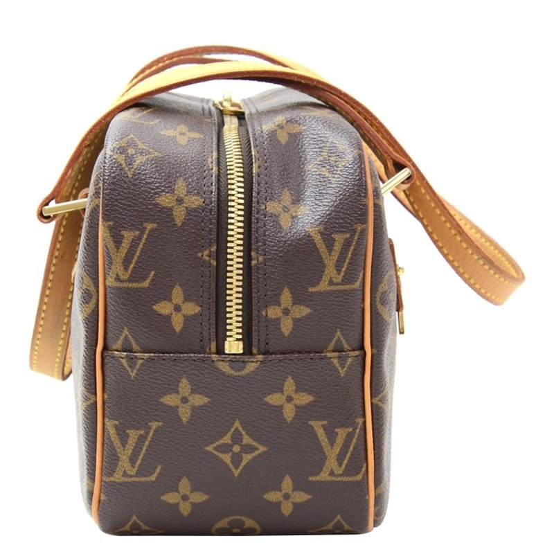 LOUIS VUITTON MONOGRAM CITE SHOULDER BAG, traditional brown monogram canvas  with leather trim and pale gold tone hardware, double zip closure at the top  and zippered front pocket, 25cm x 18cm H