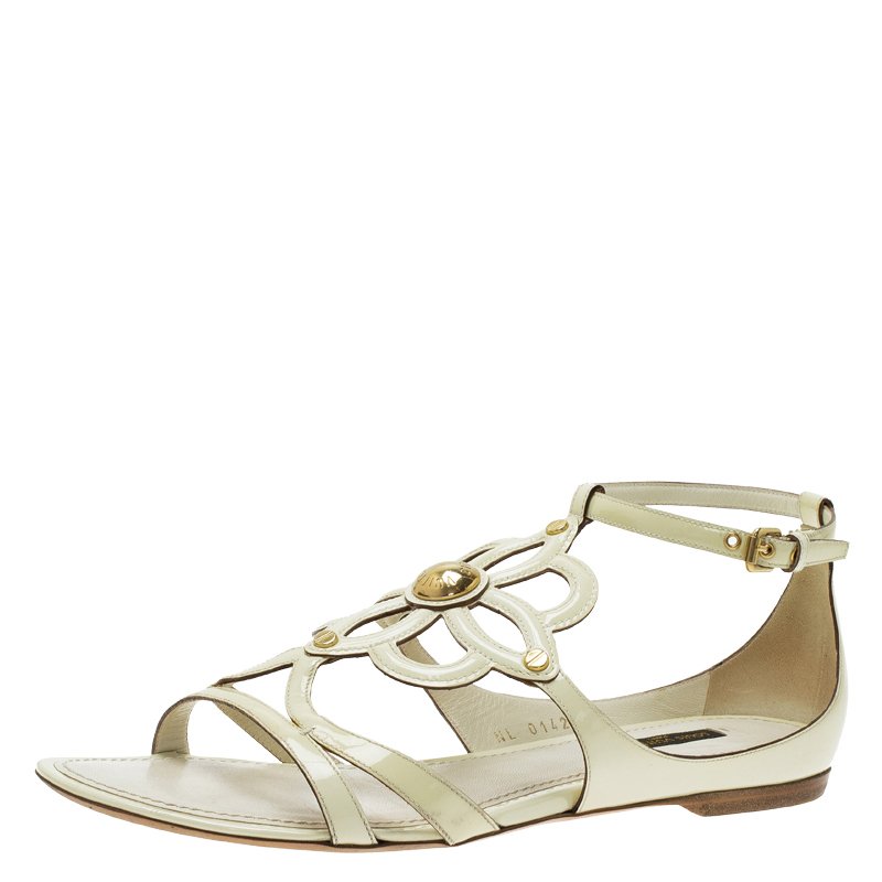 مملوكة مسبقًا Louis Vuitton Cream Patent Leather Cutout Gloss Flat Sandals Size 38