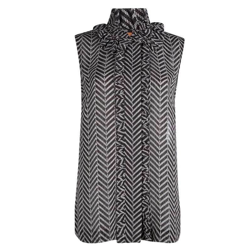 Pre Owned توب توري برش بني طباعة شيفرون بكشكشة بلا أكمام XL