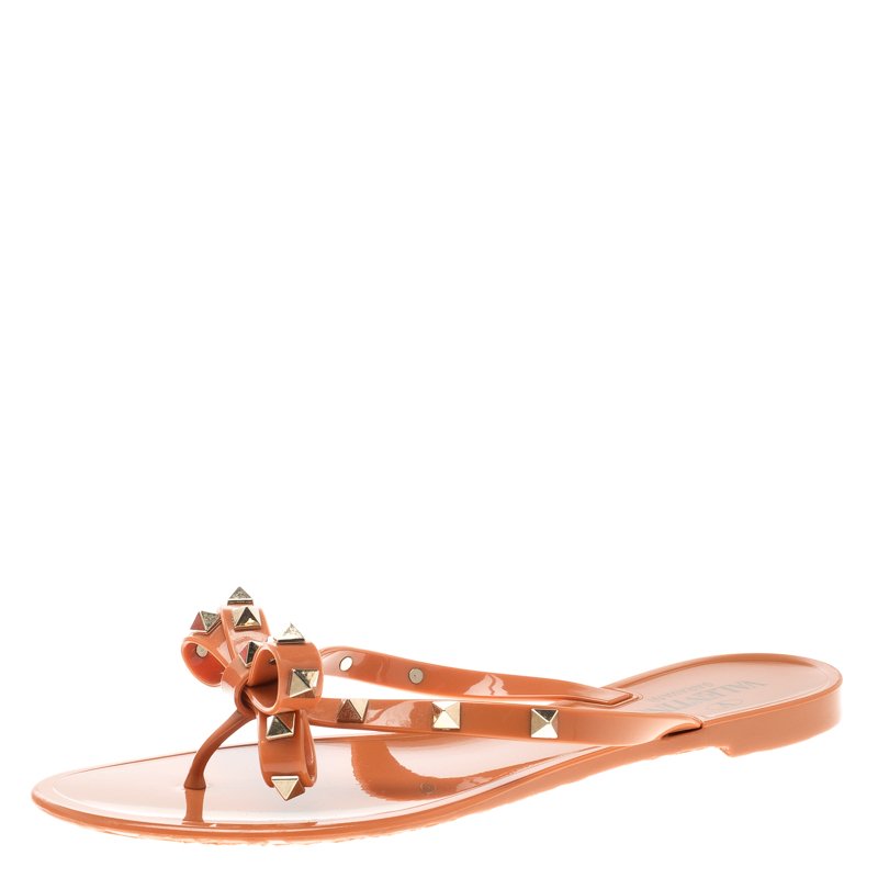 Pre Owned Valentino Orange Jelly Rockstud Bow Flat Sandals Size 39