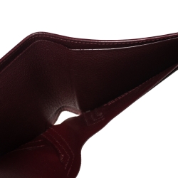 Pre Owned محفظة كارتييه "موست دو كارتييه 6 سي سي" ثنائية الطية جلد عنابي