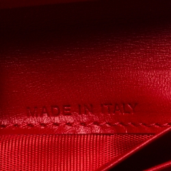 Pre Owned Christian Louboutin Neon Orange Leather Clipsos Studded Bifold Wallet