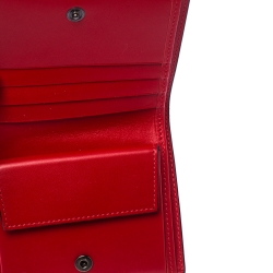 Pre Owned Christian Louboutin Neon Orange Leather Clipsos Studded Bifold Wallet