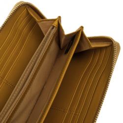 Pre Owned Coach Yellow Madison Leather Accordion Zip Wallet