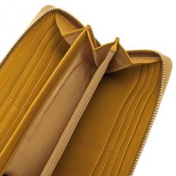 Pre Owned Coach Yellow Madison Leather Accordion Zip Wallet