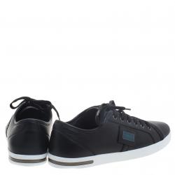 مملوكة مسبقًا حذاء رياضي دولتشي آند غابانا جلد أسود رقبة منخفضة مزين بالشعار المطلي مقاس 43.5