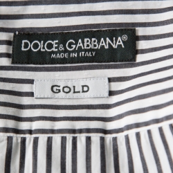 Pre Owned  قميص دولتشي أند غابانا بأزرار على الوجه قطن مخطط دوبي مونوكروم ذهبي L