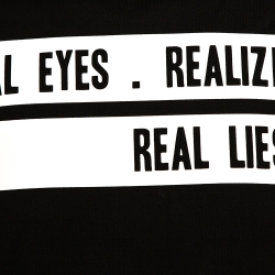 Pre Owned Givenchy Black Cotton 'Real Eyes' Cuban Fit T-Shirt S