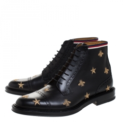 Pre Owned بوت كاحل غوتشي بروغ جلد نقش نجمة ونحلة ذهبي / اسود مقاس 44