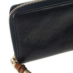 Pre Owned Gucci Black Guccissima Zip Around Bamboo Tassel Wallet