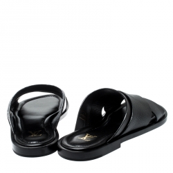 Pre Owned حذاء سلايدز لوي فيتون فلات سيور متعاكسة فوش جلد أسود مقاس 42.5