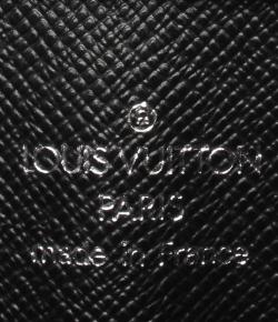 Pre Owned Louis Vuitton Black Taiga Leather Pochette Baikal Wallet