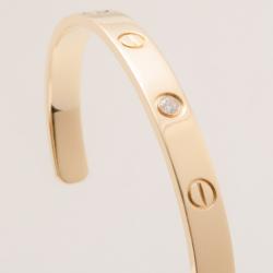 Pre Owned Cartier 18K 'U' Shaped Open Cuff Love Bracelet with Central Diamond